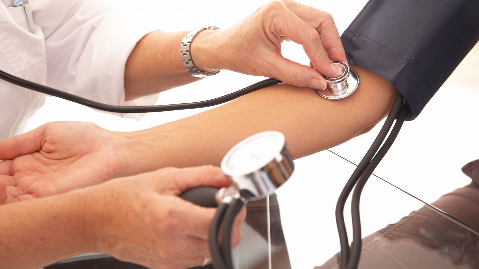 checking blood pressure