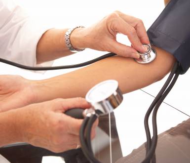 checking blood pressure